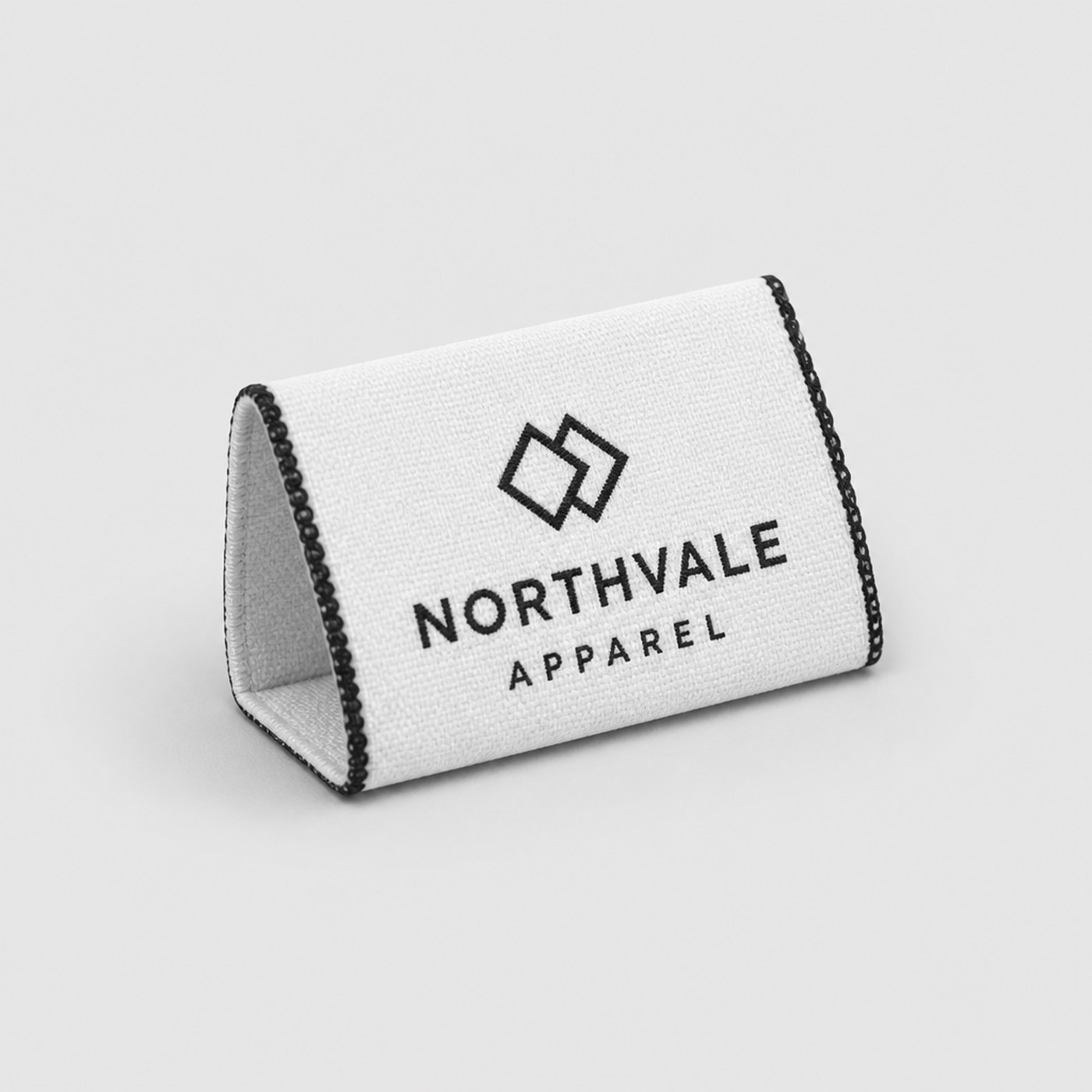 Custom center-fold woven clothing label
